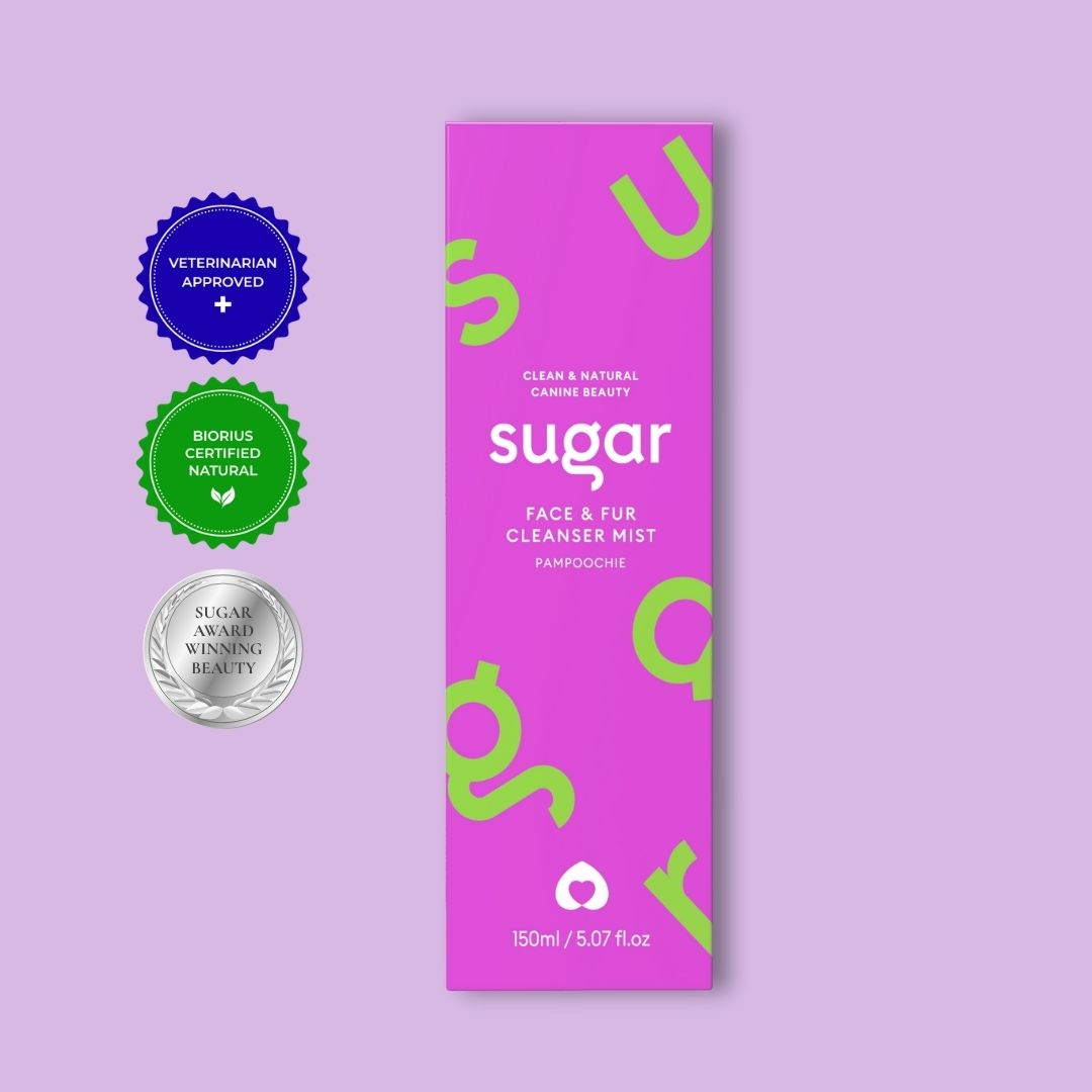 Purple packaging of Sugar Face & Fur Cleanser Mist with green accents on a purple background